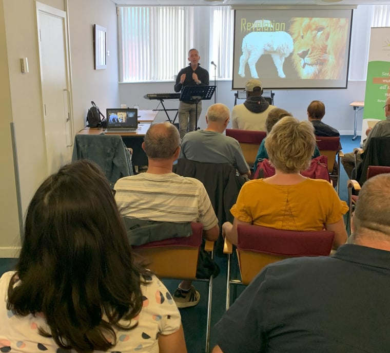 Church gathering in the Beacon Room